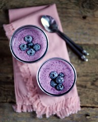 Protein cocktail of yogurt, milk, honey and blueberries.