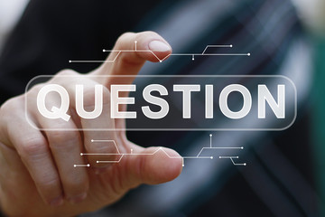 Businessman presses button question icon virtual digital electronic user interface.