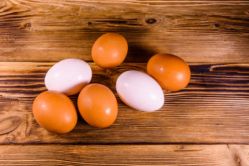 Boiled eggs on the old wooden table