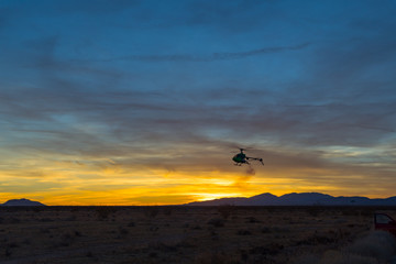 Naklejka na ściany i meble Sunset Helicopter 