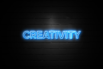 Creativity neon Sign on brickwall