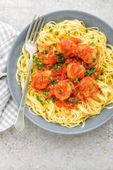 Pasta, vermicelli with meatballs in tomato sauce. Italian cuisine