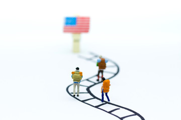 Miniature people: Travelers are visiting the United States. Image use for traveling abroad, business concept.