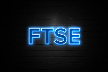 Ftse neon Sign on brickwall