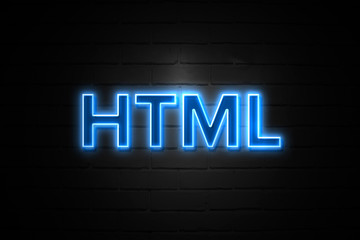 Obraz premium Html neon Sign on brickwall