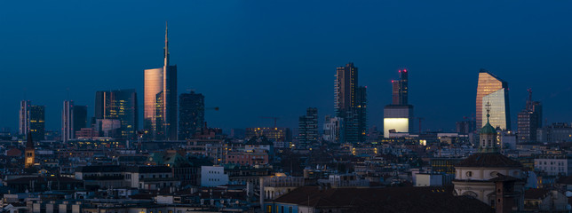 Milan (Italy) skyline by night; cityscape with new Porta Nuova skyscrapers, panoramic view from the...