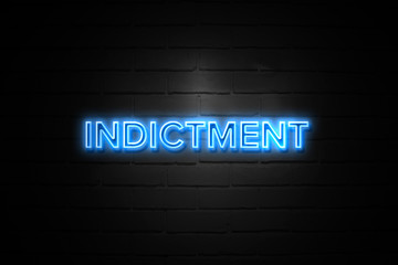 Indictment neon Sign on brickwall