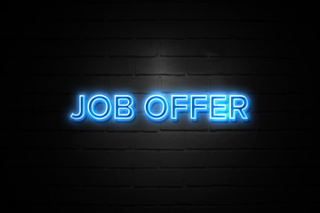 Job Offer neon Sign on brickwall