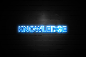 Knowledge neon Sign on brickwall