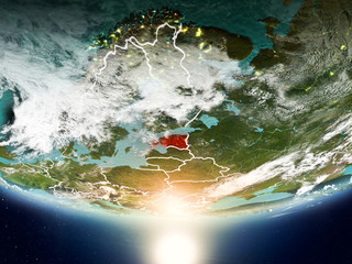 Estonia with sun on planet Earth