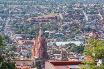 Foto op Canvas A view of San Miguel de Allende, from up high, including the Parroquia de San Miguel Arcángel and Bellas Artes © Kathleen