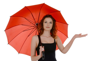 Young woman with red umbrella checking if it's raining