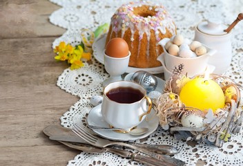 Easter feast, Easter cake and painted eggs 