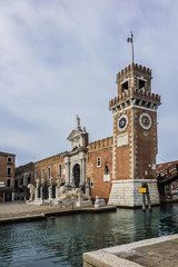 Fototapeta na wymiar View of Venetian Arsenal (Arsenale di Venezia). Venetian Arsenal is a complex of former shipyards and armories clustered. Construction of Arsenal began in 1104, during Venice republican era. Italy.