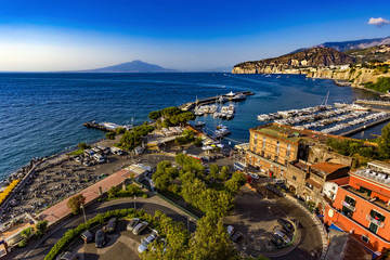 Italy. Sorrento. Fantastic scenery of Sorrento Coast from harbour. There is Mount Vesuvius in the background