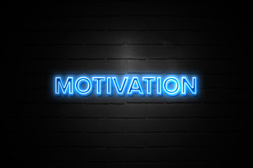 Motivation neon Sign on brickwall