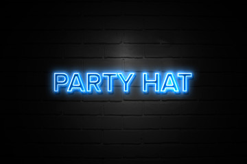 Party Hat neon Sign on brickwall