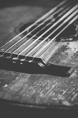 close up of wooden classic acoustic guitar with strings