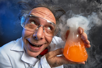 Happily crazy chemist with his experiment - obrazy, fototapety, plakaty