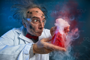 wacky scientist with explosive experiment - obrazy, fototapety, plakaty