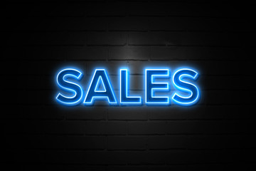 Sales neon Sign on brickwall