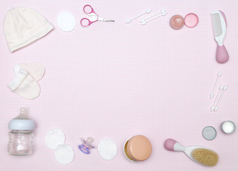 Newborn items on the pink background