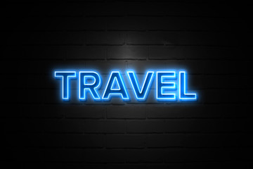 Obraz premium Travel neon Sign on brickwall