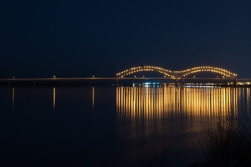 Fototapeta na wymiar Long Exposure Bridge Lights on the Mississippi River
