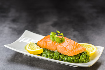 salmon on spinach
