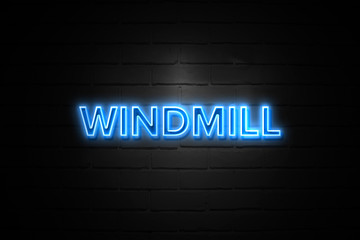 Windmill neon Sign on brickwall