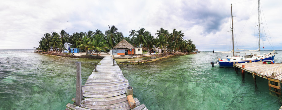 Tobacco Caye Is A Very Tiny Island In The Caribbean Sea Off The Coast Of Central Belize, Known For Diving, Snorkeling And Relaxing Vacations.