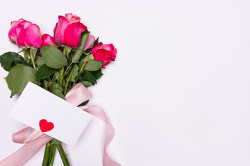 Bouquet of roses on white background. Valentine's Day, birthday or wedding greeting