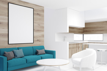 Wooden living room corner, blue sofa, poster