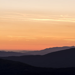 layers of mountains at golden hour