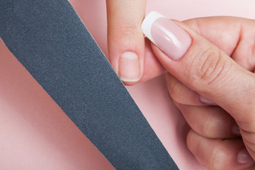 Manicure in beauty salon. SPA procedure, macro shot.
