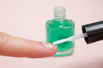 Manicure in beauty salon. SPA procedure, macro shot.
