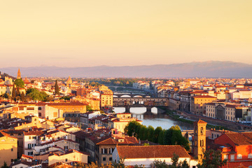 Fototapeta na wymiar Beautiful views and peace of Florence cityscape in the background Ponte Vecchio bridge at sunrise