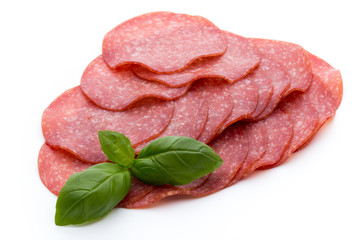 Salami slices isolated on white background.