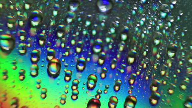 Diffraction and interference of solar radiation. Scientific visualization of the wave nature of light. Extremely macro. All the colors of the rainbow.