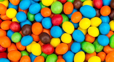Round colorful candies as abstract background.