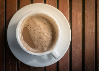 Mocha hot coffee in white cup.