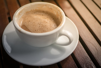 Mocha hot coffee in white cup.