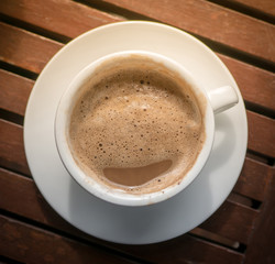 Mocha hot coffee in white cup.