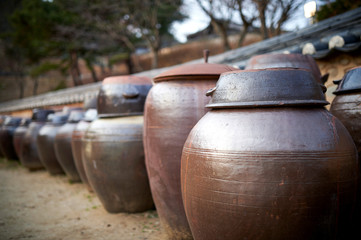 Platform for crocks of sauces and condiments in a farm, South Korea.