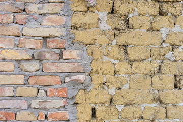 adobe and red brick wall
