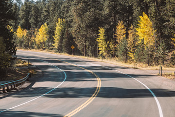 Highway at autumn in Colorado, USA.