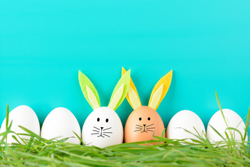 Row of Easter eggs with adornments