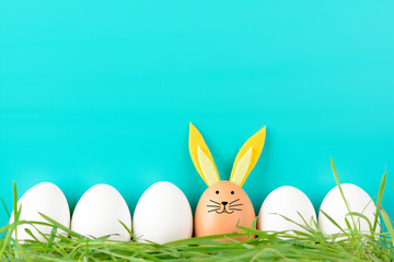 Row of Easter eggs with adornments