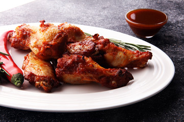 crispy barbecue chicken wings bbq on grey background