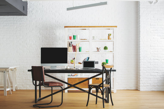 Corporate loft interior with workplace